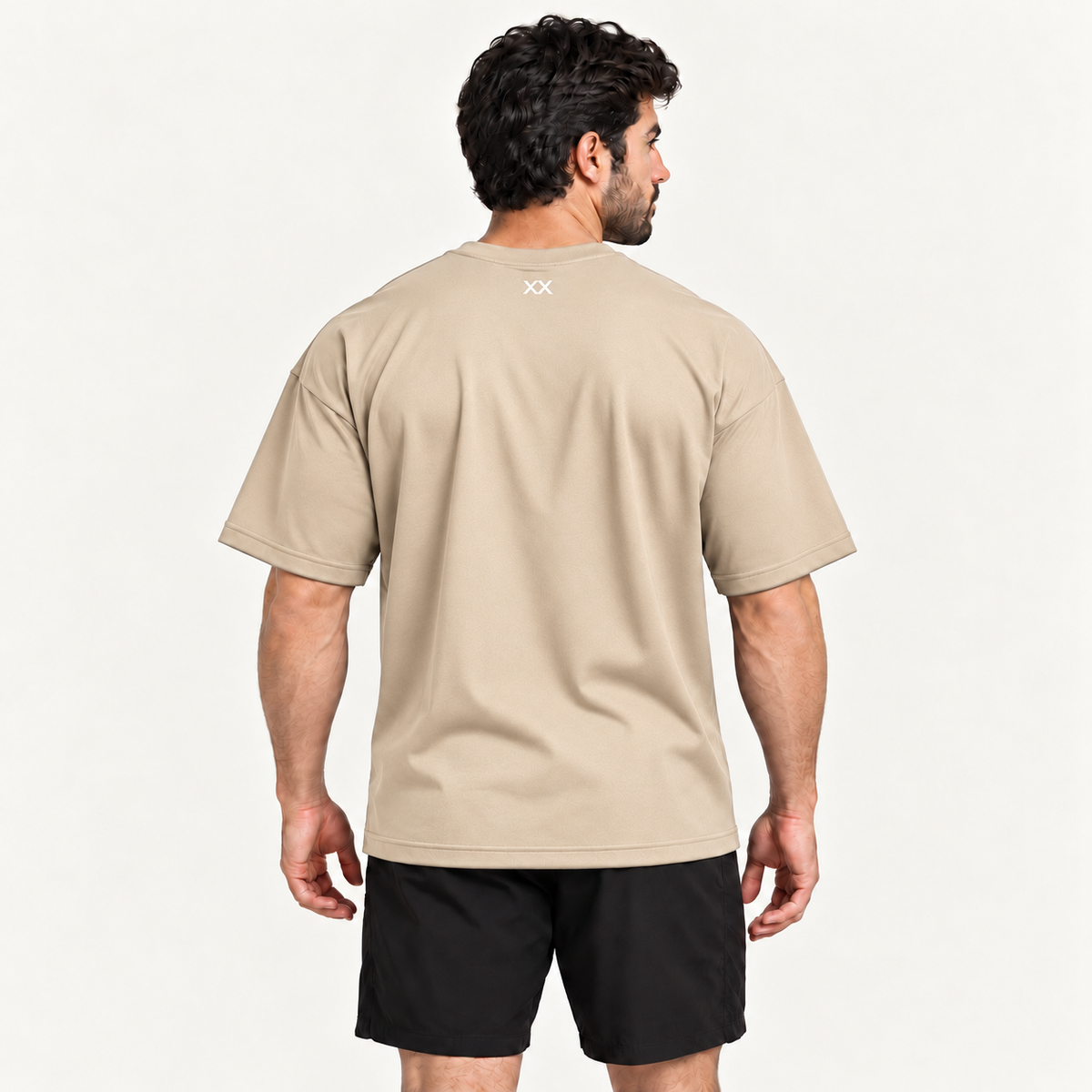 Camiseta Oversized Premium Grexx bege — costas com símbolo XX na nuca