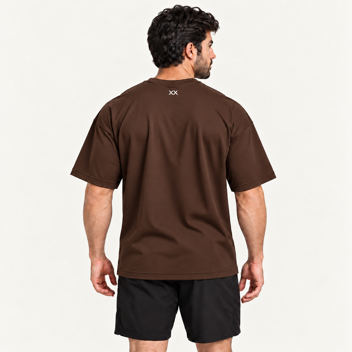 Camiseta Oversized Premium Grexx marrom — costas com símbolo XX na nuca