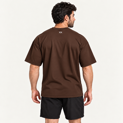 Camiseta Oversized Premium Grexx marrom — costas com símbolo XX na nuca